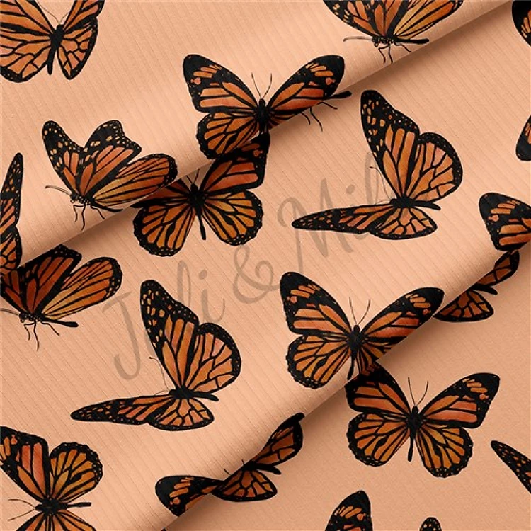 Peach Butterflies Rib Knit Fabric, Yard & Get a Free $89.99 Embroidery Bundle