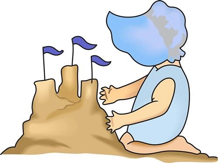 BABY AND SAND CASTLE