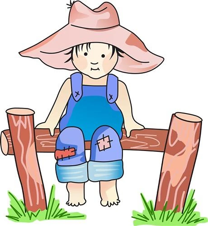 BOY SITTING ON FENCE