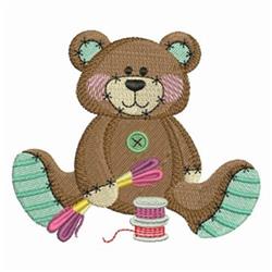 Playful brown bear with pastel accents and a button, surrounded by colorful spools and sewing tools. Quilting design.