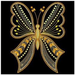 Ornate butterfly with intricate yellow and gold wings on a solid black background, perfect for quilting.