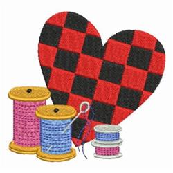 Colorful checkered heart in red and black, surrounded by pink and blue spools of thread, perfect for quilting.