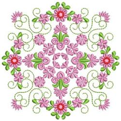 Ornate floral accent with detailed pink flowers, green leaves, and swirling vines, perfect for quilting projects.
