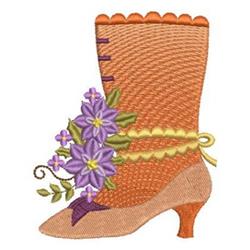 Vintage boot in vibrant orange adorned with purple flowers and a yellow ribbon, featuring intricate detailing.