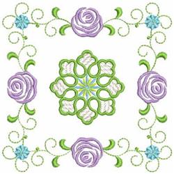 Ornamental floral design featuring vibrant purple roses, decorative green vines, and soft blue flowers, perfect for quilting.