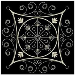 Elegant floral design with intricate motifs and swirl patterns in a geometric layout, perfect for quilting.