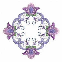 Quilting floral design showcasing intricate purple flowers and elegant green swirls in a detailed pattern.