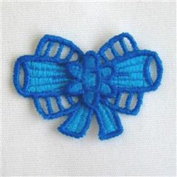 FSL bow in shades of blue with lace-like sections, intricate details, and a delicate design for decorative uses.
