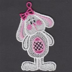 FSL bunny rabbit with floppy ears and a pink bow, featuring a honeycomb pattern, perfect for Easter decor.