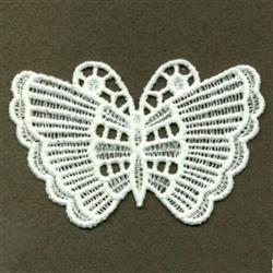 FSL butterfly in delicate white lace showcases intricate wing patterns and elegant symmetry against a dark background.