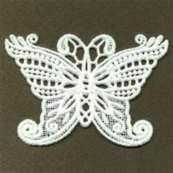 FSL butterfly with delicate white lacework, intricate patterns, and symmetry on a dark brown background.