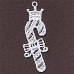FSL candy cane with crown, intricate lace texture, white embroidery, festive bow on a rich brown background.