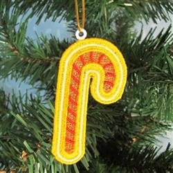 FSL candy cane ornament in yellow with red stripes, hanging from a green evergreen tree for a festive Christmas look.