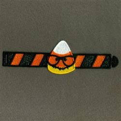 FSL candy corn character with glasses and a scowl, vibrant orange and yellow on caution tape for Halloween.