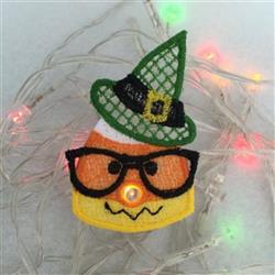 FSL candy corn character with glasses and a green witch hat, styled for Halloween with vibrant colors against a soft backdrop