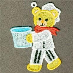 FSL bear dressed as a chef with a white hat, red scarf, black striped pants, and a blue bucket.