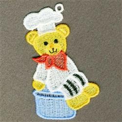 FSL bear in a chef uniform with a white hat, red scarf, and seated in a blue bowl, showcasing vibrant colors.