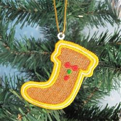 FSL Christmas stocking ornament with a golden yellow outline, adorned with holly berries, hanging on a pine branch.