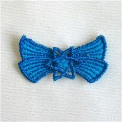 FSL decorative bow in vibrant blue showcases dimensional texture and intricate layers against a neutral background.