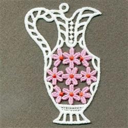 FSL decorative pitcher with intricate lace details, adorned with pink flowers and delicate leaves against a grey background.