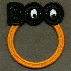 FSL Halloween design featuring playful 'BOO' text with cartoon eyes and a vibrant orange circular element.