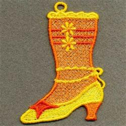 FSL high-heeled boot in vibrant yellow and orange, featuring intricate floral patterns and decorative stitching.
