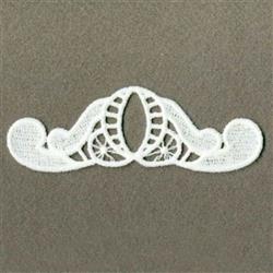 FSL lace design featuring delicate cut-out patterns and symmetrical shapes, highlighted against a soft background.
