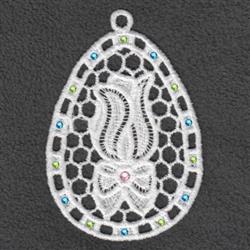 FSL lacy egg-shaped decoration with intricate floral design and colorful rhinestones, perfect for Easter.