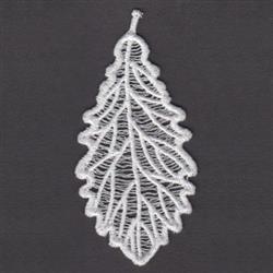 FSL leaf lace in white, featuring intricate vein patterns and a smooth outline against a dark background.