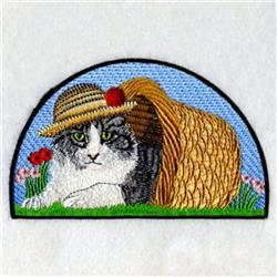 Playful gray cat with a straw hat and red flower lounges beside a woven basket on a vibrant blue background.