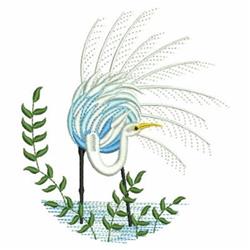 Colorful heron with blue feathers stands in water, surrounded by lush green foliage, showcasing vibrant wildlife.