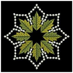 Leaf design featuring a star shape of green leaves and white beads, structured and ornamental, ideal for quilting.