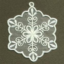 Ornate snowflake in FSL with delicate floral motifs, intricate looped edges on a dark backdrop, perfect for winter decor.