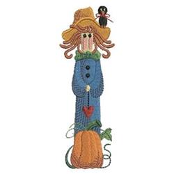 Whimsical scarecrow with a blue coat and yellow hat, holding a heart next to a pumpkin, adorned with a spider in fall colors.