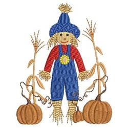Colorful applique scarecrow in blue overalls with straw hair, surrounded by pumpkins and corn stalks for autumn décor.