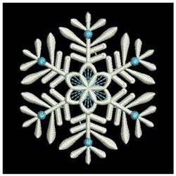 FSL snowflake with detailed white embroidery and blue beads, elegantly crafted for winter decor.