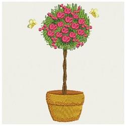 Vibrant topiary tree with green foliage and pink flowers in a whimsical style, set in a cheerful yellow pot.