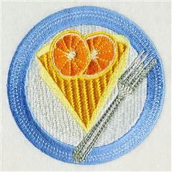 Colorful waffle adorned with orange slices on a blue plate, accompanied by a silver fork. Playful and vibrant.