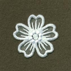 Delicate white flower embroidered with intricate details on dark olive background, ideal for home decor.