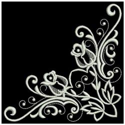 FSL white roses entwined with swirling tendrils and leaves, detailed embroidery on a solid black background.