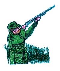 Colorful hunter in green aiming a shotgun with detailed clothing in lush grass, ideal for outdoor themes.