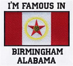 Birmingham flag design with bold red and white sections, yellow circle, star, and prominent text. Standard.
