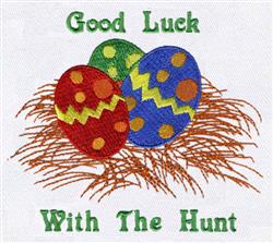 Colorful Easter eggs in a grass nest: red, green, and blue with vibrant patterns, celebrating the festive spring season.