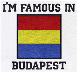 Funny flag design with bold red, yellow, and blue stripes, featuring 'I'M FAMOUS IN BUDAPEST' text.
