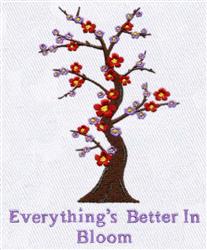 Colorful flowering tree with red and purple blossoms highlights a playful spring design with text below.