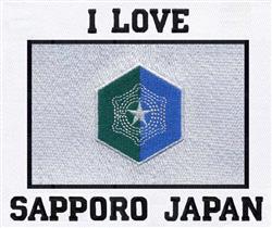 Hexagonal emblem with a star design in green and blue, framed by 'I LOVE' and 'SAPPORO JAPAN' text.
