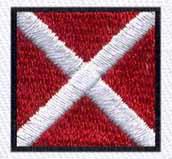 Bold square embroidery design featuring a vibrant red background, a striking white cross, and a thin black border.