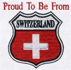 Patriotic shield featuring a raised red texture with a white cross, black text reads 'PROUD TO BE FROM'.