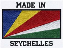 Vibrant Seychelles flag in applique style with blue, yellow, red, and green triangles framed by a black outline.
