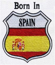 Shield with Spanish flag in vibrant red and yellow, 'Born In' text above, perfect for casual wear.